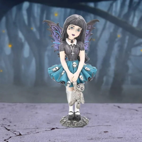 Gothic Fairy Figurine Resin Statue Black Teal Dress Wings Gothic fairy figurine with iridescent wings, teal skull skirt, and voodoo doll in misty forest.