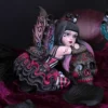 Gothic fairy figurine with purple wings holding ornate skull on dark velvet background.