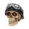 Biker Skull Sculpture Resin Beige With Black Helmet And Goggles A beige human skull wearing a black biker helmet with silver aviator goggles on top.