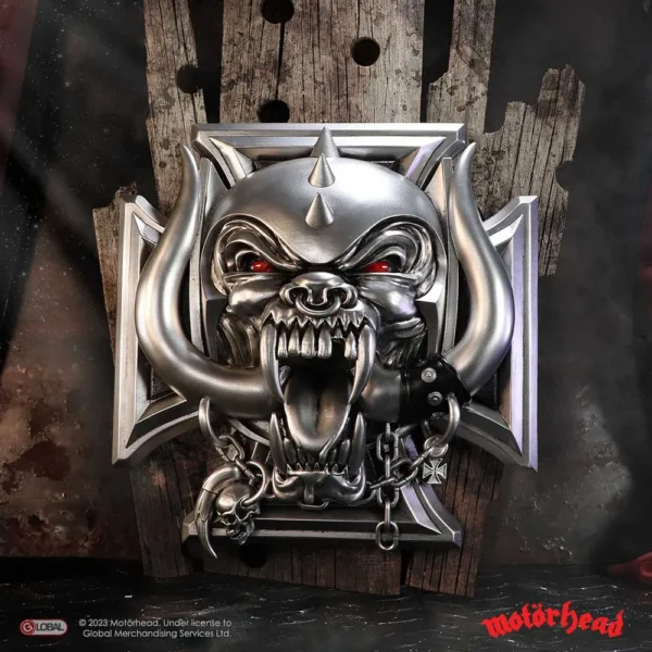 Motörhead War-Pig Emblem Chrome Metal Silver - Red Eyes Chrome Motörhead War-Pig emblem with red eyes, chains, and Iron Cross on dark background.