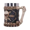 Gothic Skull Mug Resin Black with Metal Rim and Bone Handle A gothic-style black mug decorated with detailed skull and bone designs and a metal rim.