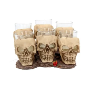 Skull Shot Glass Set Resin Holders Bone White Gothic Design Six clear shot glasses held in detailed skull-shaped holders on a rustic wooden base.