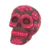 Pink Sugar Skull Sculpture - Floral Soap Art Decoration A pink floral sugar skull decorated with detailed soap flower petals and green leaves.