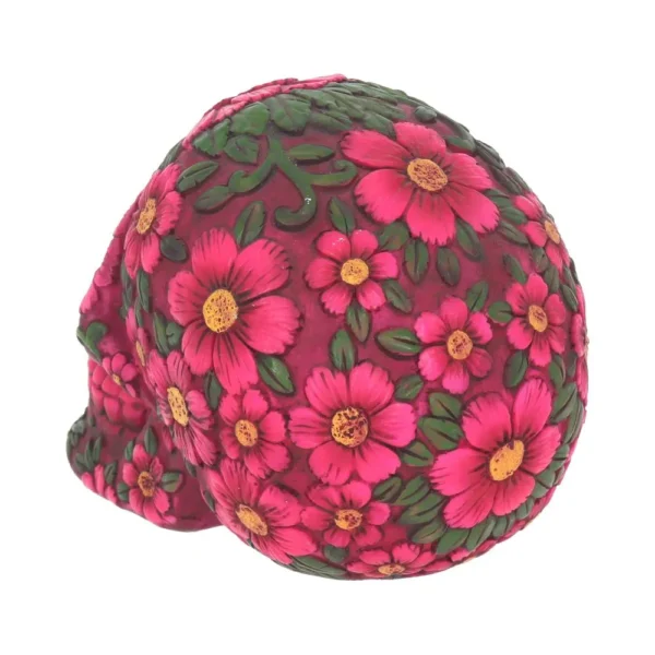 Pink Floral Skull Sculpture Resin Art - Vibrant Flower Design A pink floral soap skull decorated with detailed pink and yellow flowers and green leaves.