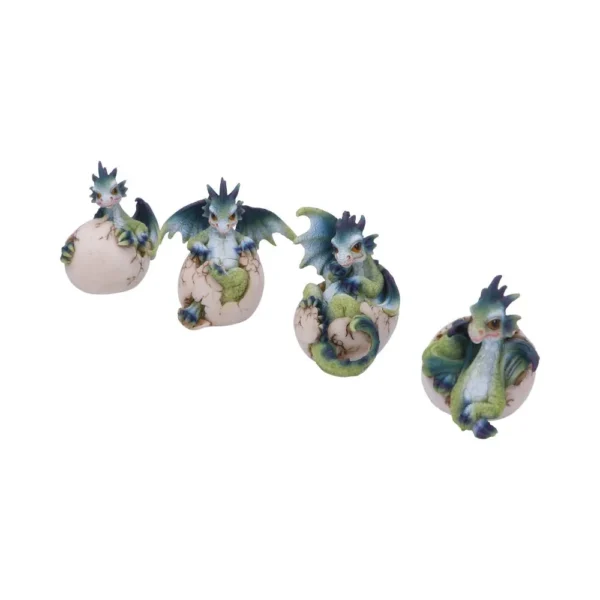 Four green and blue baby dragon figurines hatching from cracked cream-colored eggs in a row.