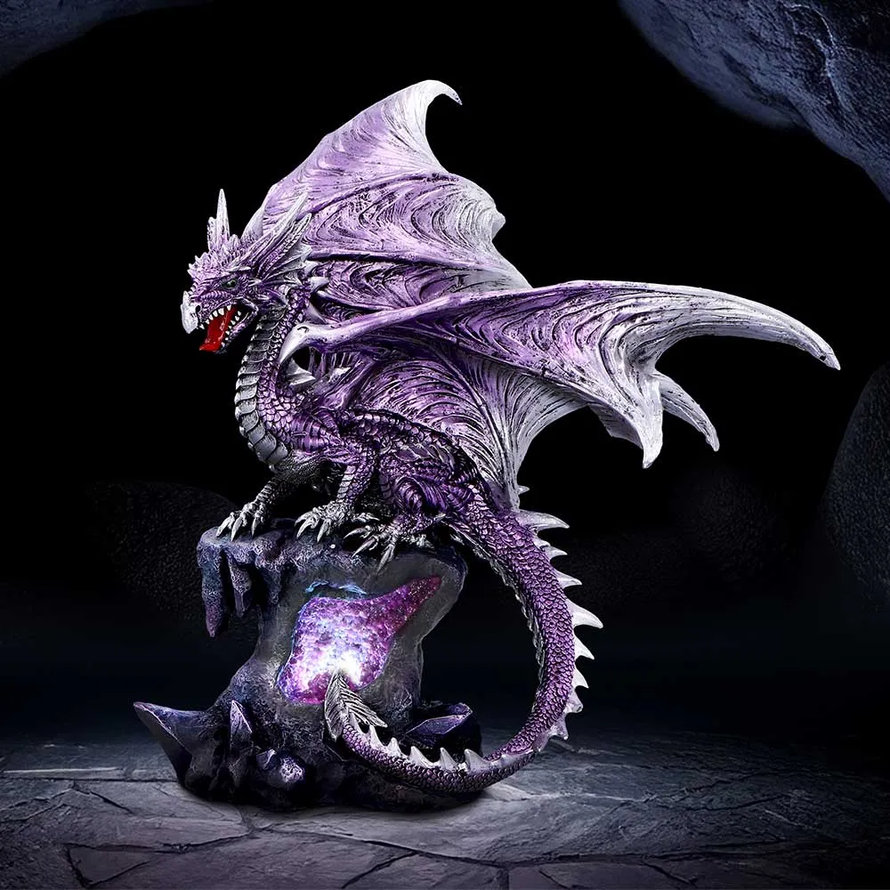 What Makes a Gift Collectable? 4 What makes a gift collectable? A metallic purple and silver dragon statue perched on glowing amethyst rocks.