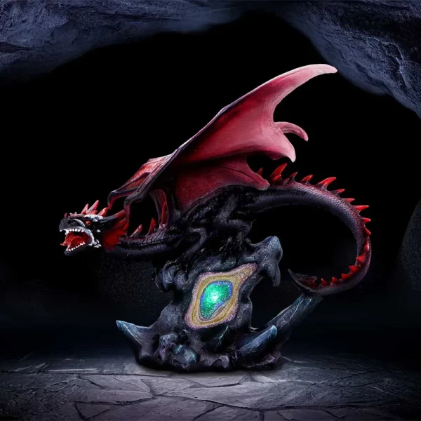 Black Red Dragon Statue Resin Sculpture - Glowing Crystal Base Collectable Home Accessories A black and red dragon statue guarding a glowing green-blue crystal in a dark cave.