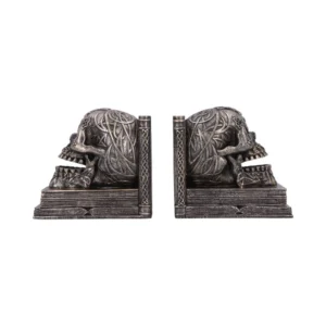 Celtic Skull Bookends Metal Antique Finish - Engraved Gothic Decor Celtic skull bookends with intricate engravings on stacked book bases, gothic home decor The-Hidden-Hatch