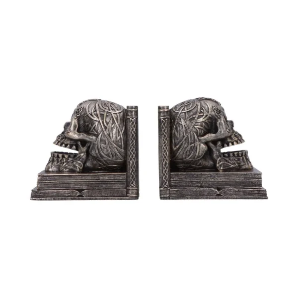 Celtic Skull Bookends Metal Antique Finish - Engraved Gothic Decor Celtic skull bookends with intricate engravings on stacked book bases, gothic home decor The-Hidden-Hatch